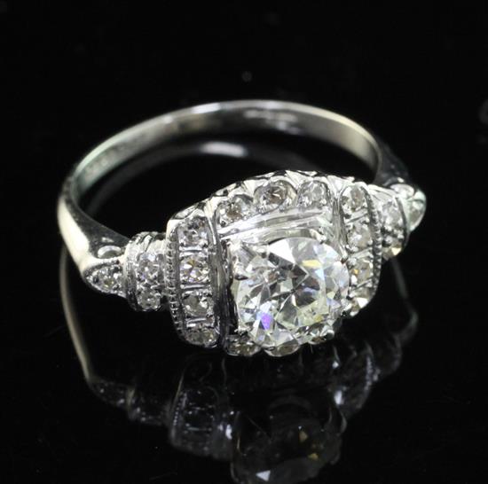 A platinum and iridium, diamond cluster ring, size K.